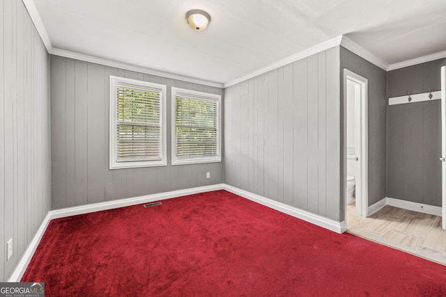 spare room with ornamental molding