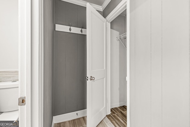 mudroom featuring crown molding