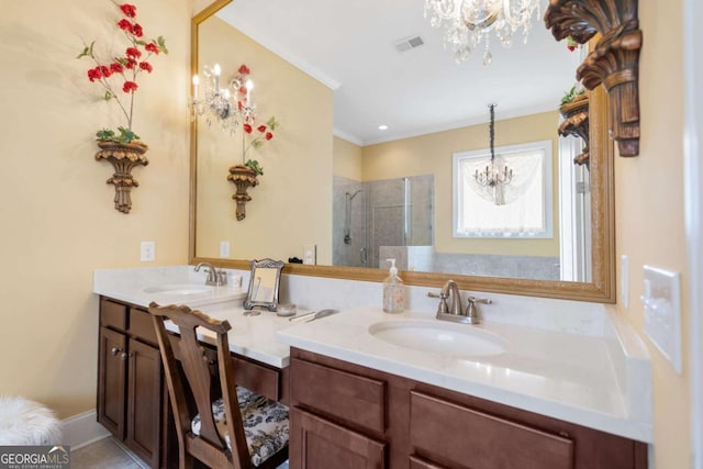 bathroom with vanity, a shower with door, tile patterned flooring, ornamental molding, and a notable chandelier