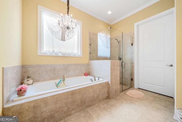 bathroom featuring separate shower and tub, tile patterned floors, an inviting chandelier, and ornamental molding