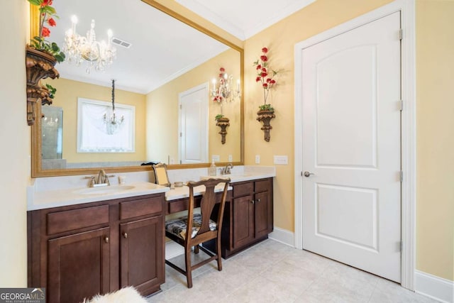 bathroom featuring a chandelier, vanity, crown molding, and tile patterned flooring