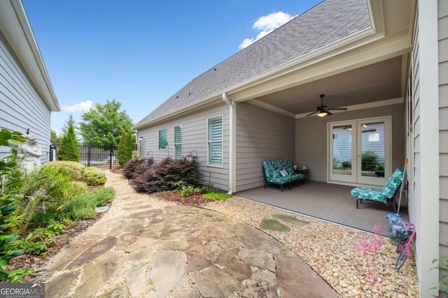 view of patio / terrace featuring ceiling fan and french doors