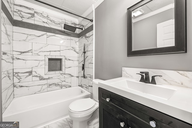 full bathroom with tiled shower / bath combo, toilet, ornamental molding, and vanity