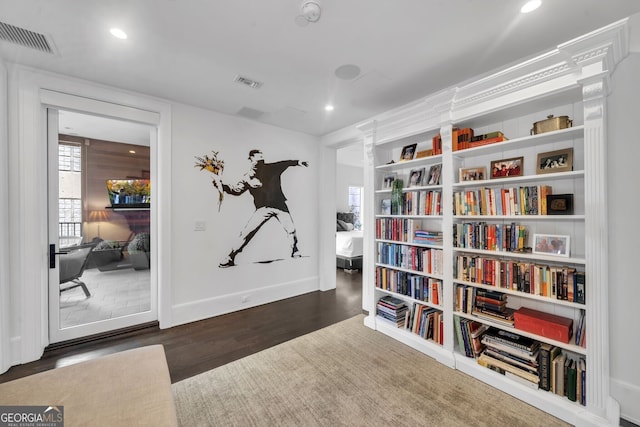 living area with dark wood-type flooring