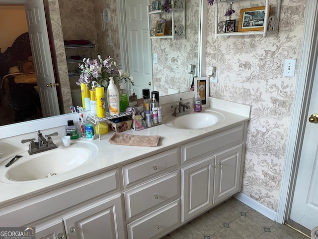 bathroom featuring tile patterned floors and vanity