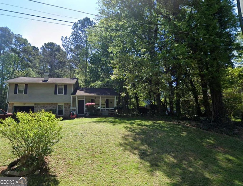 view of yard featuring a garage