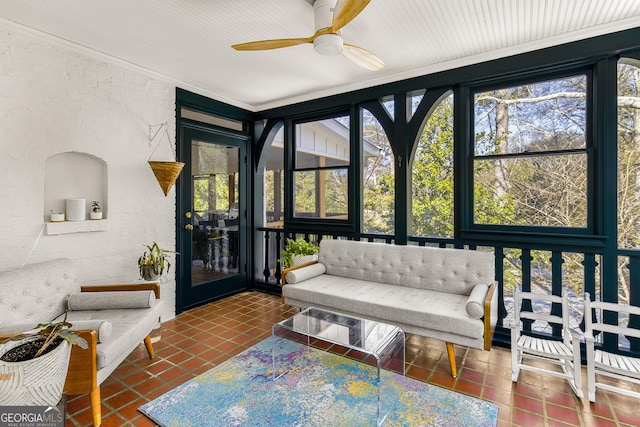 sunroom / solarium with ceiling fan