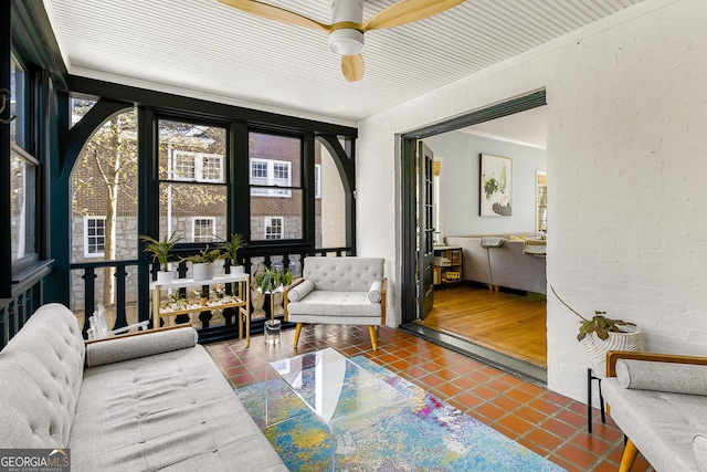 interior space featuring ceiling fan