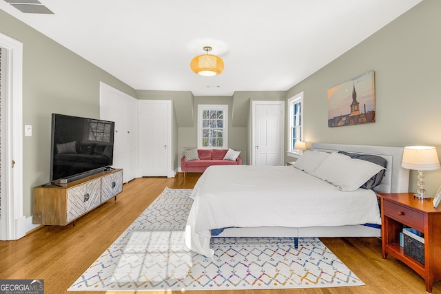 bedroom featuring hardwood / wood-style flooring