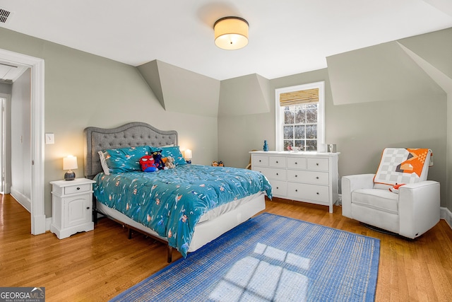 bedroom featuring light wood-type flooring