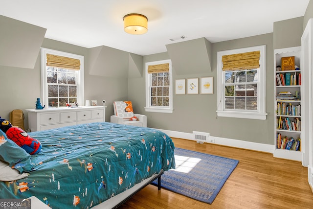 bedroom featuring light hardwood / wood-style flooring