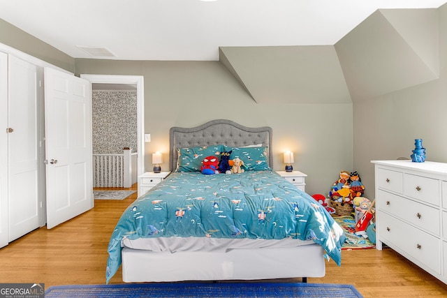 bedroom with light wood-type flooring