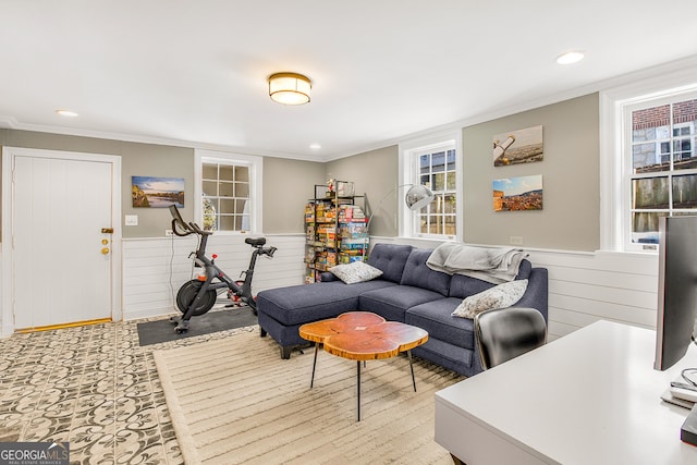 living room with ornamental molding