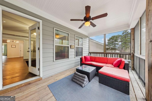 sunroom / solarium with ceiling fan