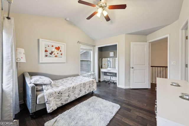 bedroom featuring vaulted ceiling, ceiling fan, and dark hardwood / wood-style floors