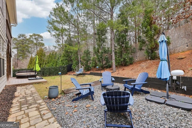 view of yard featuring a wooden deck