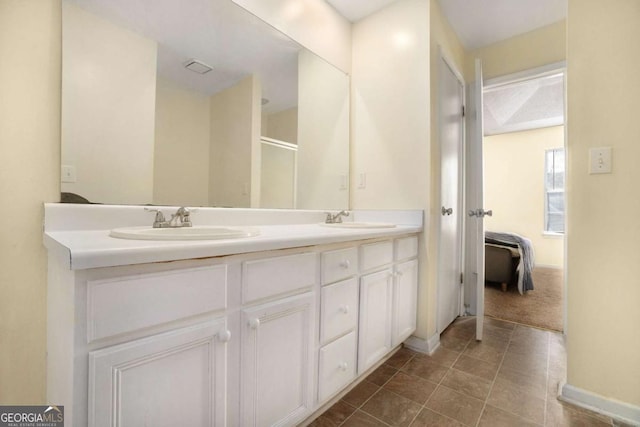 bathroom with vanity and walk in shower