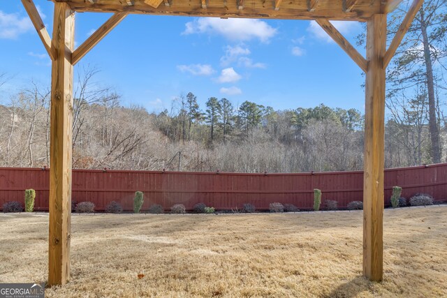 view of yard featuring fence