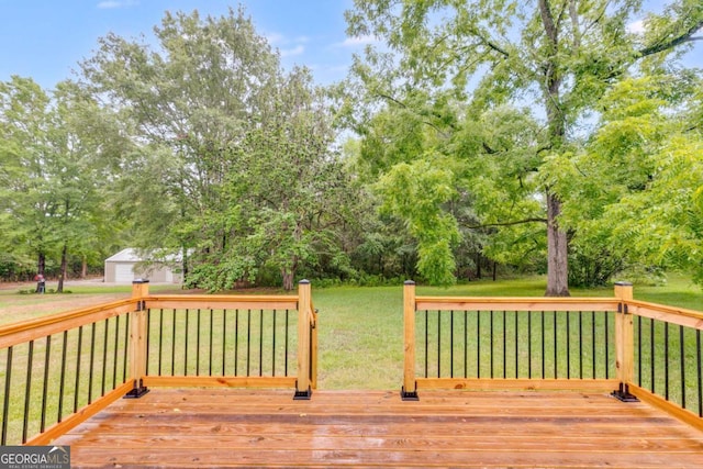 deck featuring a lawn