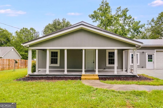 view of front of house featuring a porch and a front yard