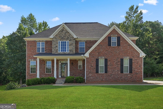 view of front of home featuring a front yard