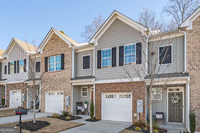 townhome / multi-family property featuring a garage