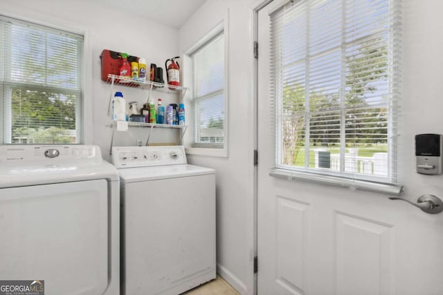 washroom with laundry area and independent washer and dryer