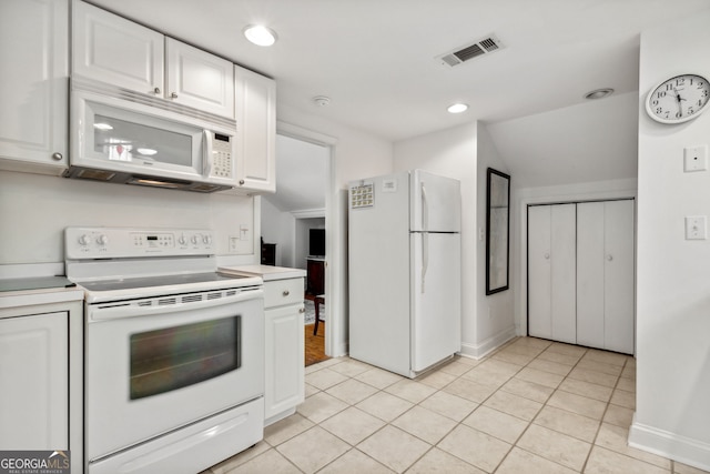 kitchen featuring white appliances, visible vents, recessed lighting, light countertops, and white cabinets