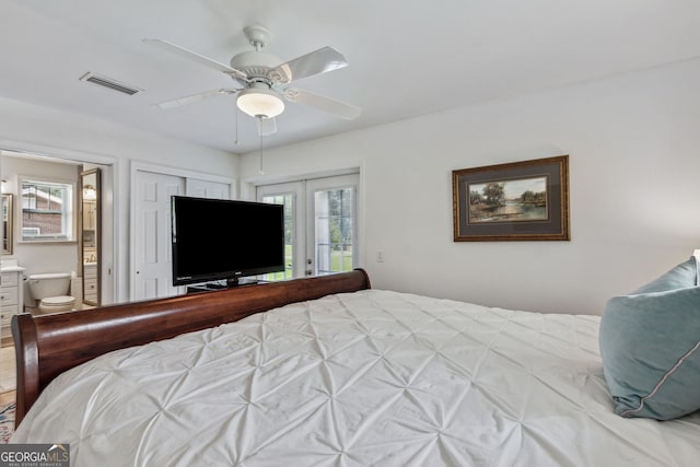 bedroom featuring access to exterior, visible vents, multiple windows, and french doors