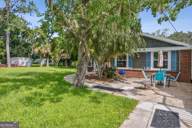 view of yard with a patio