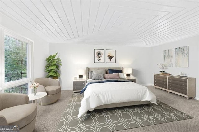 carpeted bedroom featuring wooden ceiling