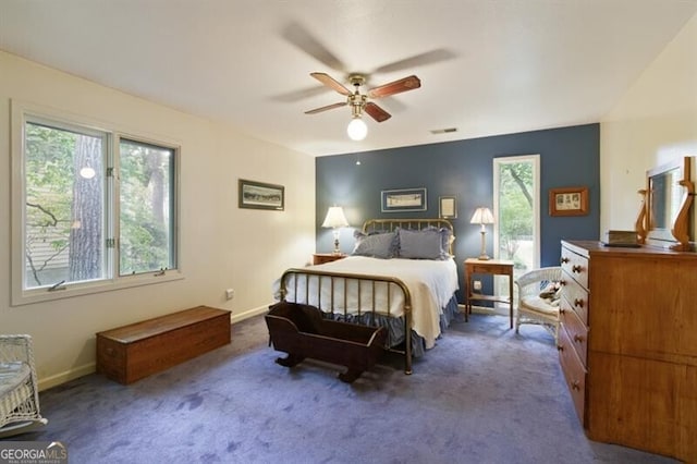 carpeted bedroom with ceiling fan