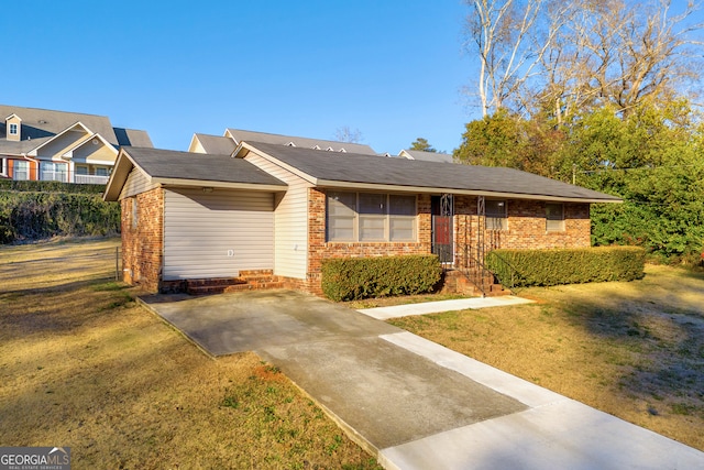 ranch-style home with a front lawn