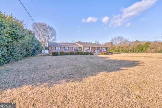 view of front of home with a front yard