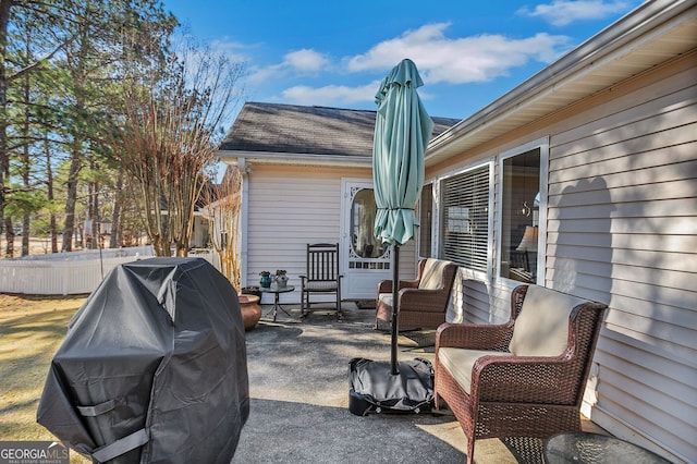 view of patio featuring a grill