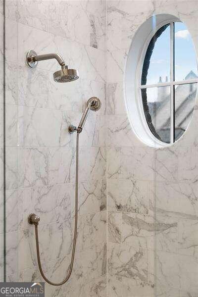 room details with a tile shower