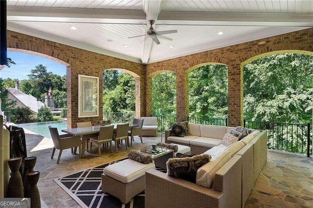 view of patio / terrace with ceiling fan and an outdoor hangout area