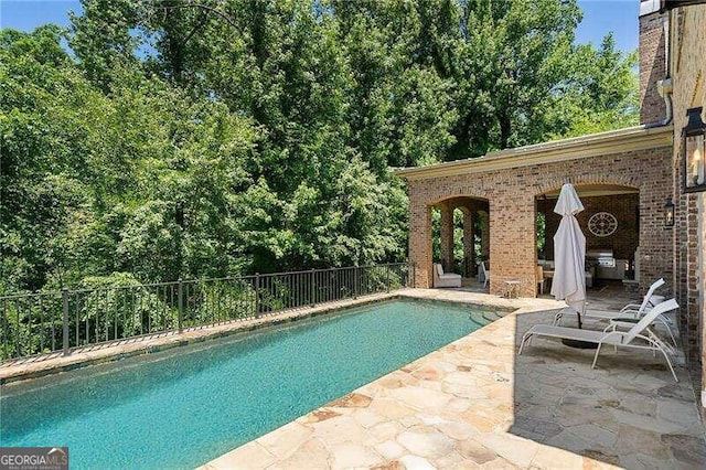 view of pool with a patio