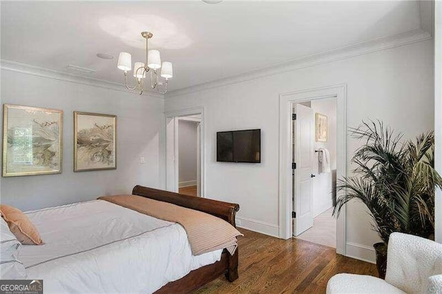 bedroom featuring crown molding, dark hardwood / wood-style floors, and an inviting chandelier