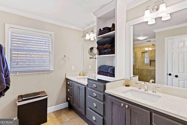 bathroom featuring tile patterned floors, crown molding, vanity, and a shower with shower door