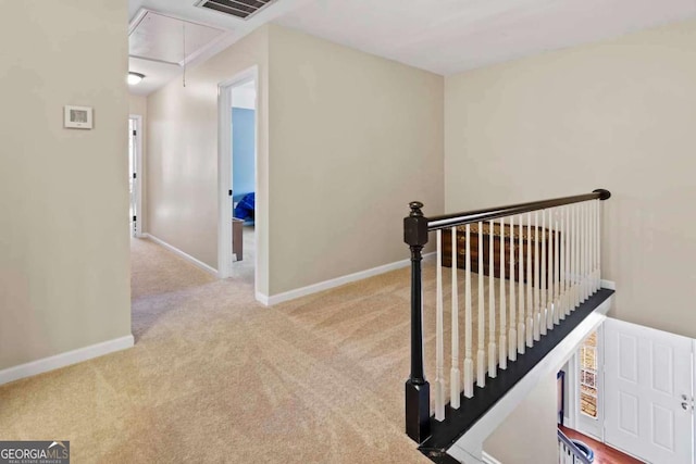 stairs with carpet flooring