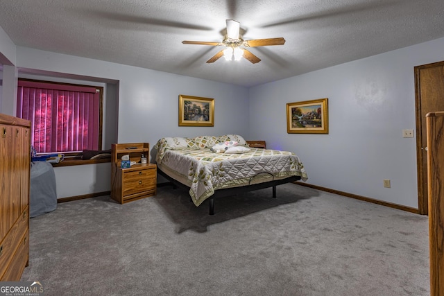 carpeted bedroom featuring a textured ceiling and ceiling fan