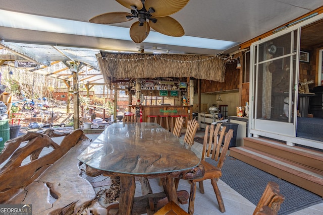 dining space with ceiling fan