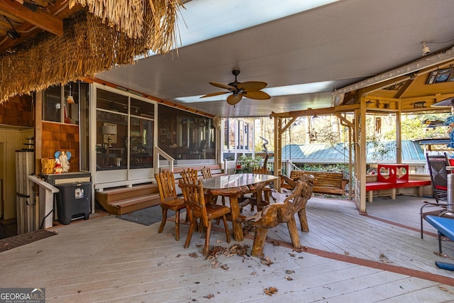 exterior space featuring hardwood / wood-style flooring and ceiling fan