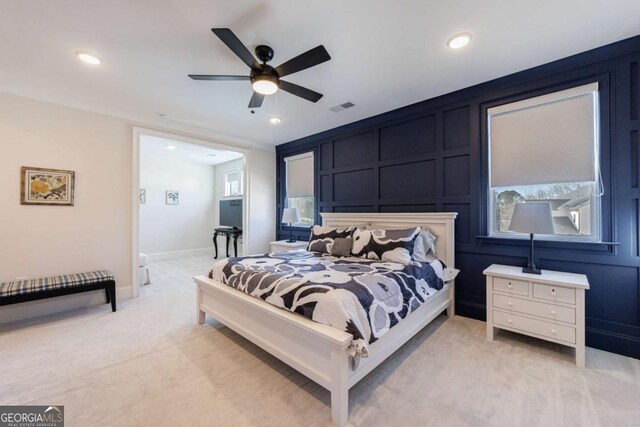 carpeted bedroom with ceiling fan