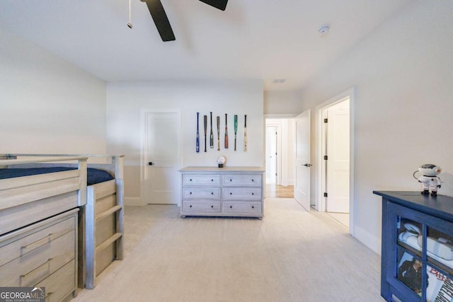 bedroom with ceiling fan and light colored carpet