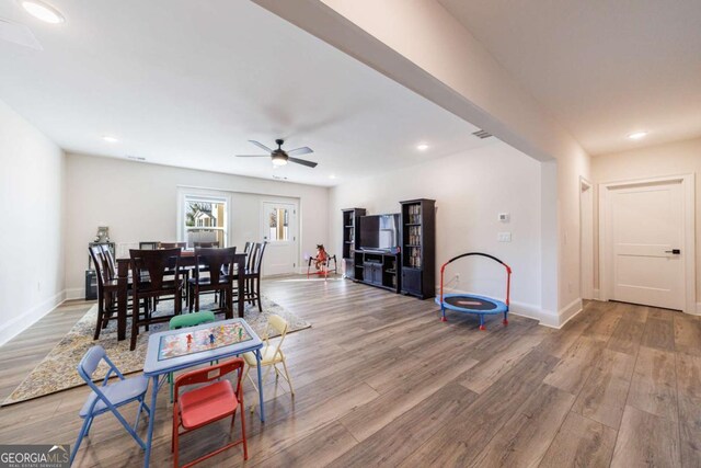 workout room featuring hardwood / wood-style flooring