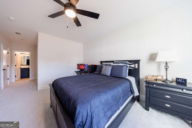 carpeted bedroom featuring ceiling fan