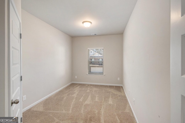 view of carpeted spare room