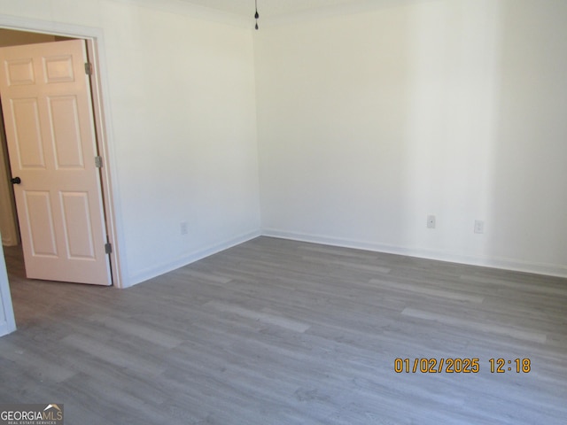 empty room with light hardwood / wood-style floors